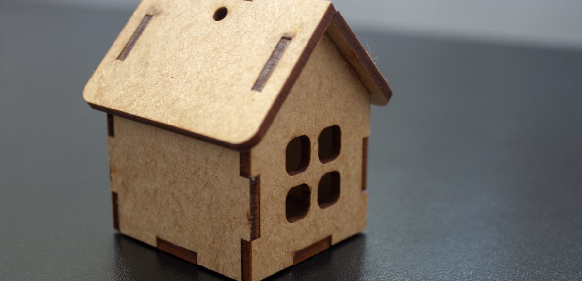 Small house made of wood on laser cut used for decoration